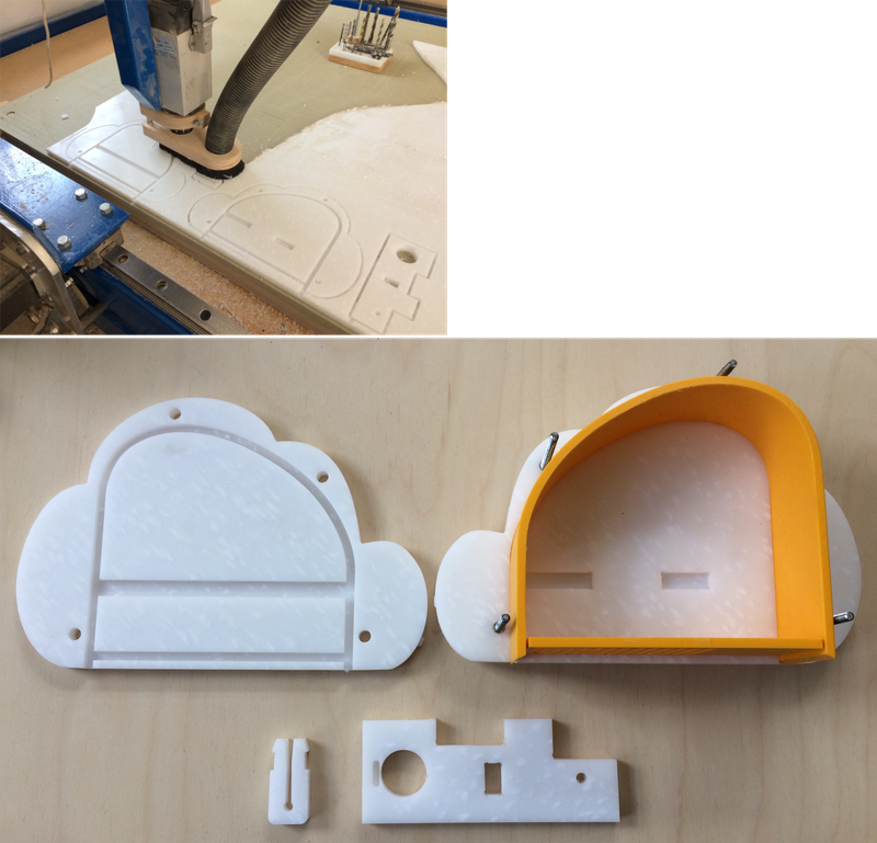 Photo of CNC machine cutting plastic and the plastic pieces all cut