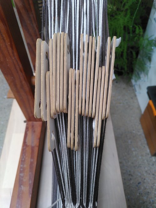 Weaver's view of the tablets on the loom, split by direction they are about to rotate.