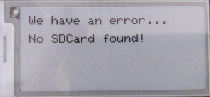 small black and white screen with text reading 'we have an error... no SD card found!'