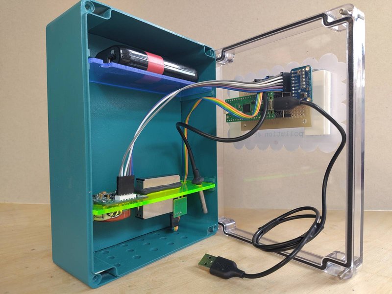 Sensor box open with the sensors, battery and wiring shown